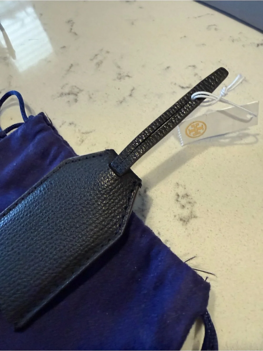 Tory Burch Black Pebbled Leather Tag with Gold-Tone Logo Plate